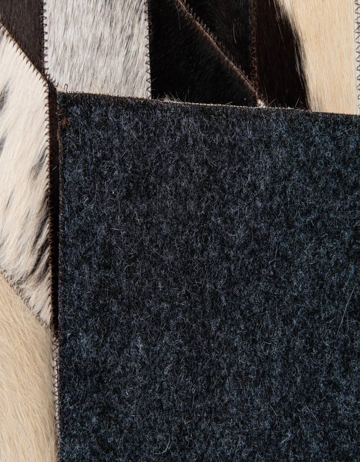 Detail image of 4' 8 x 6' 8 Cowhide Stocks Rug