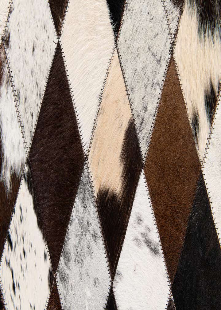 4' 8 x 6' 9 Cowhide Stocks Rug