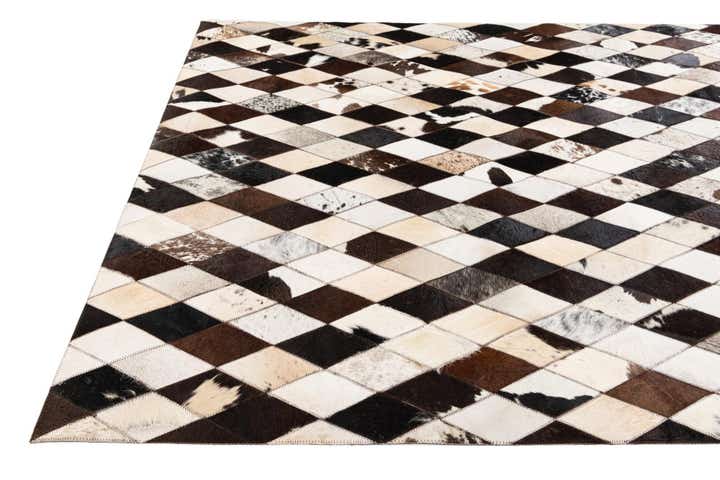 4' 8 x 6' 9 Cowhide Stocks Rug