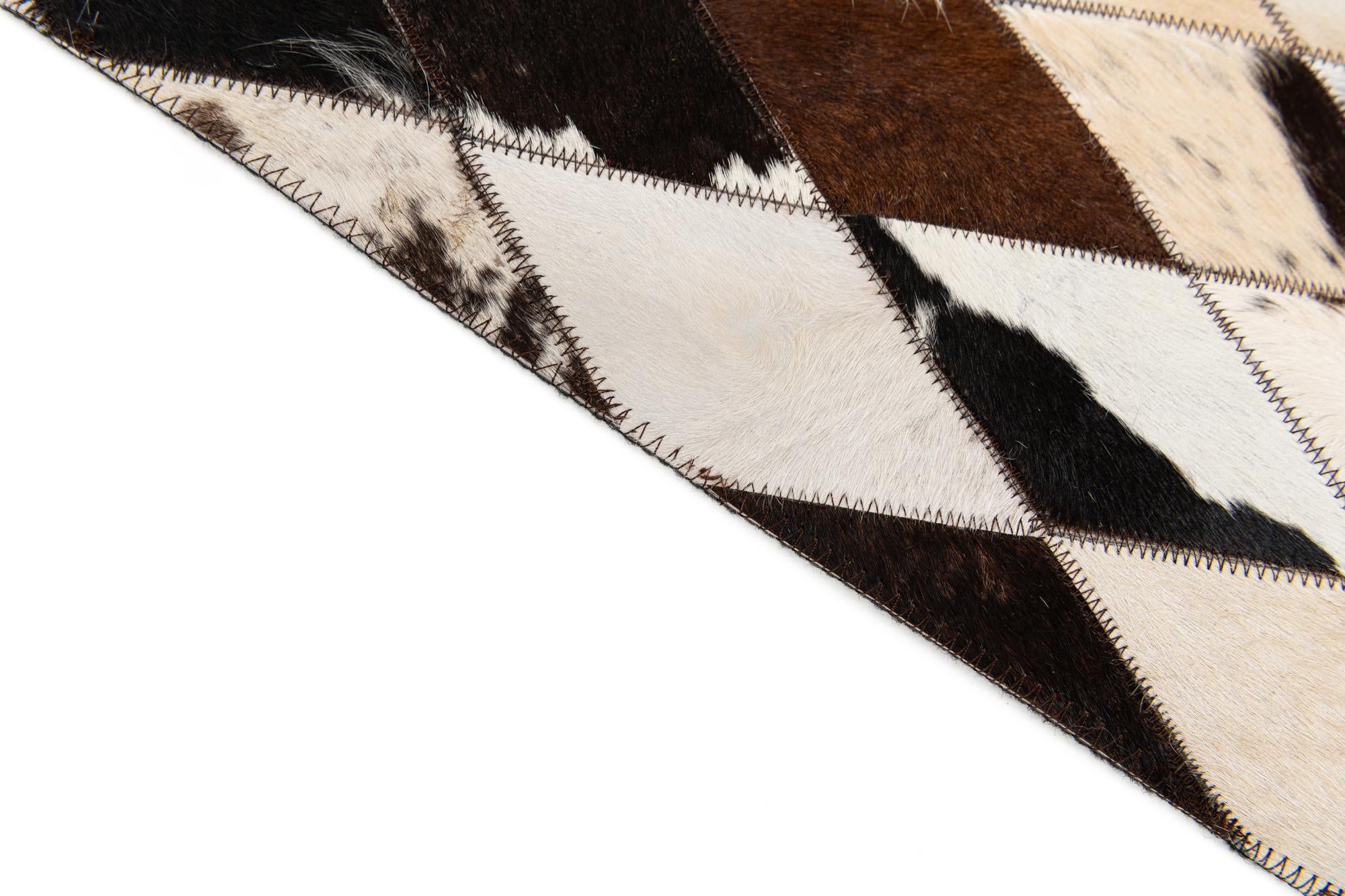 4' 8 x 6' 9 Cowhide Stocks Rug