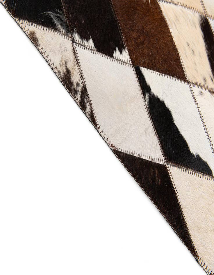 Detail image of 4' 8 x 6' 9 Cowhide Stocks Rug