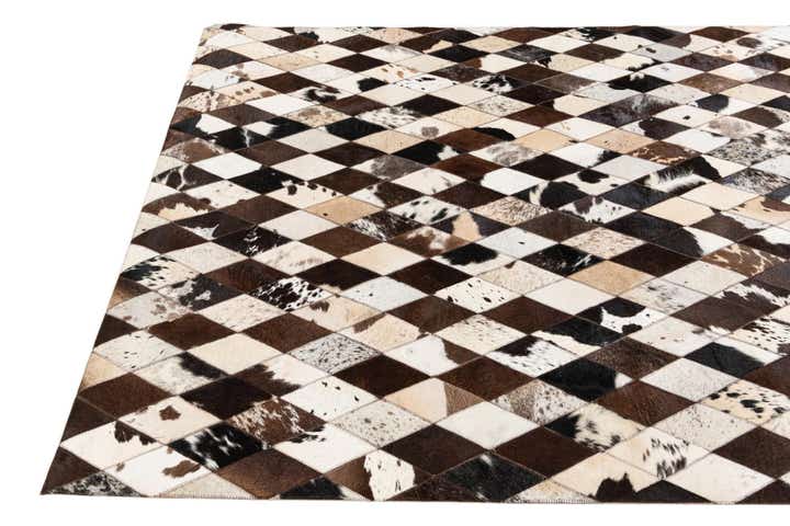 4' 8 x 6' 6 Cowhide Stocks Rug