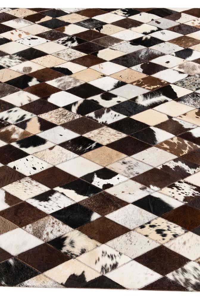 4' 8 x 6' 6 Cowhide Stocks Rug