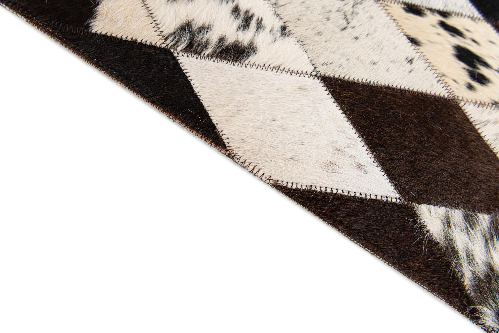 4' 8 x 6' 6 Cowhide Stocks Rug