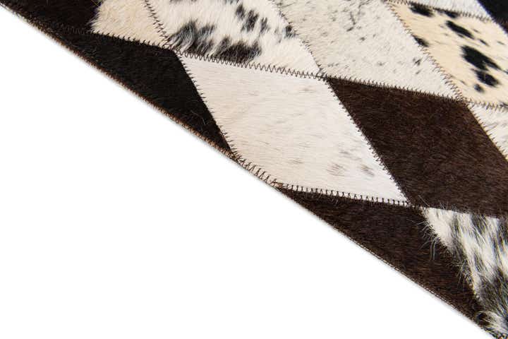 4' 8 x 6' 6 Cowhide Stocks Rug