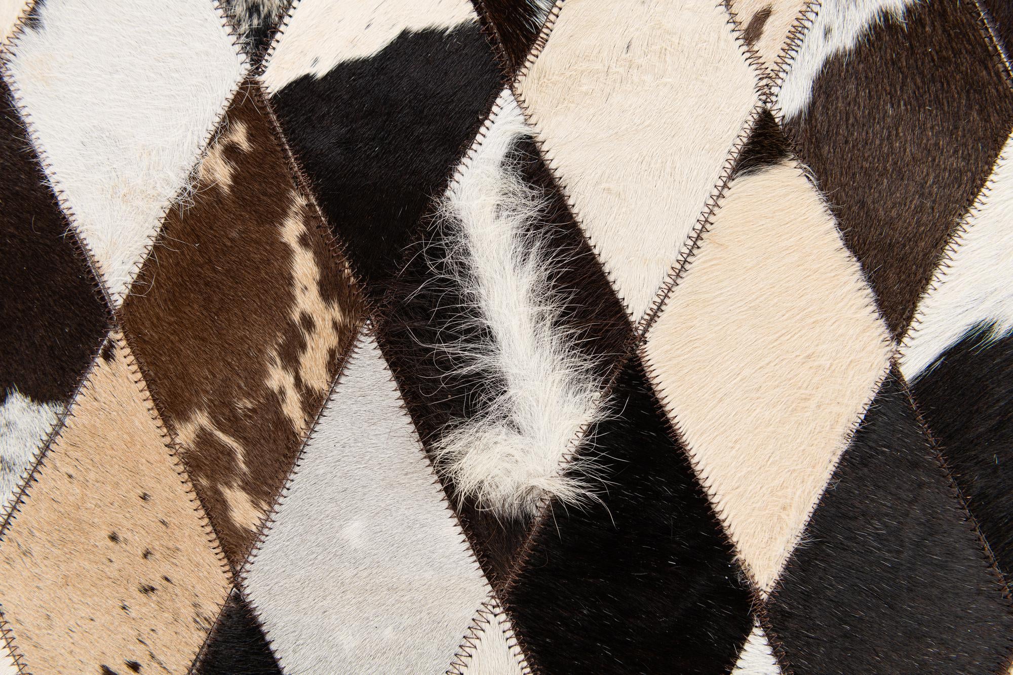 4' 8 x 6' 6 Cowhide Stocks Rug