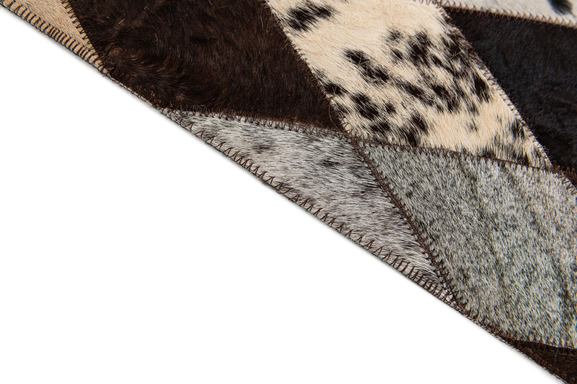 4' 8 x 6' 8 Cowhide Stocks Rug