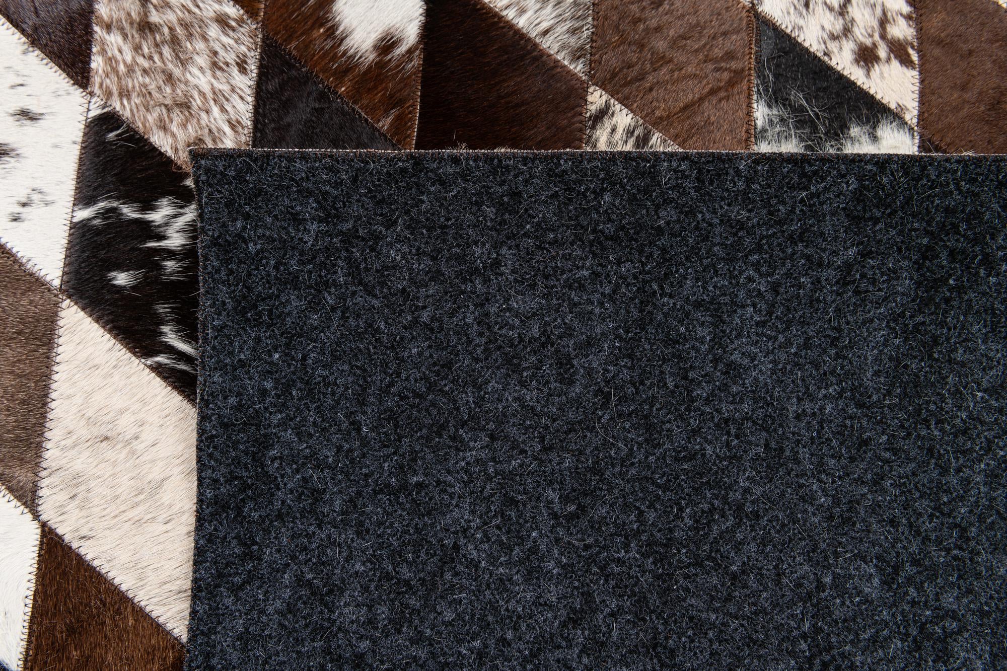 4' 8 x 6' 8 Cowhide Stocks Rug