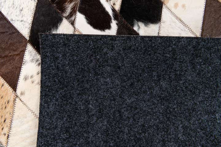 4' 9 x 6' 6 Cowhide Stocks Rug