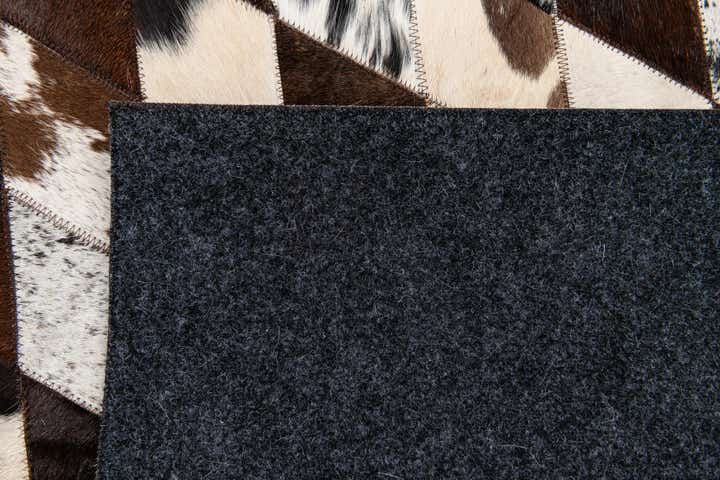 4' 8 x 6' 8 Cowhide Stocks Rug
