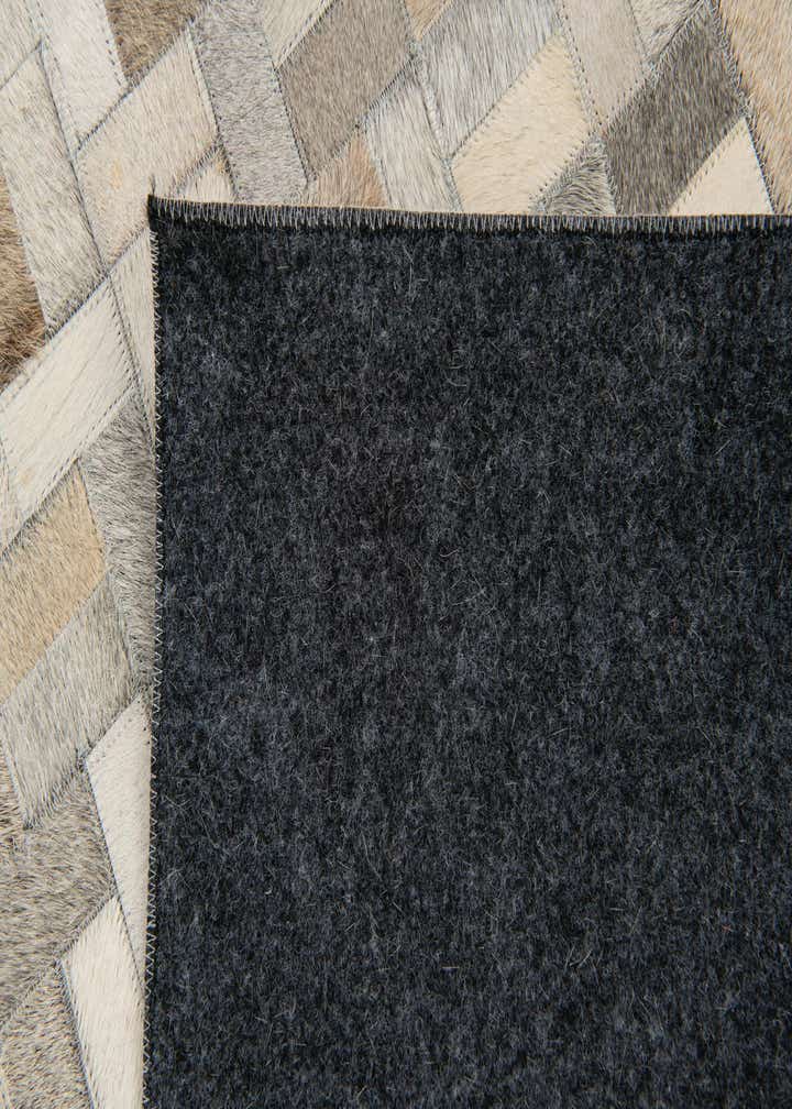 4' 7 x 6' 6 Cowhide Stocks Rug
