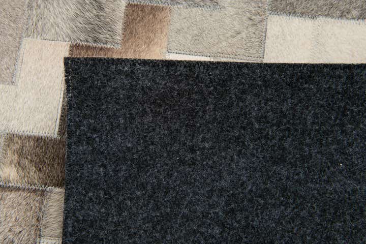 4' 9 x 6' 8 Cowhide Stocks Rug