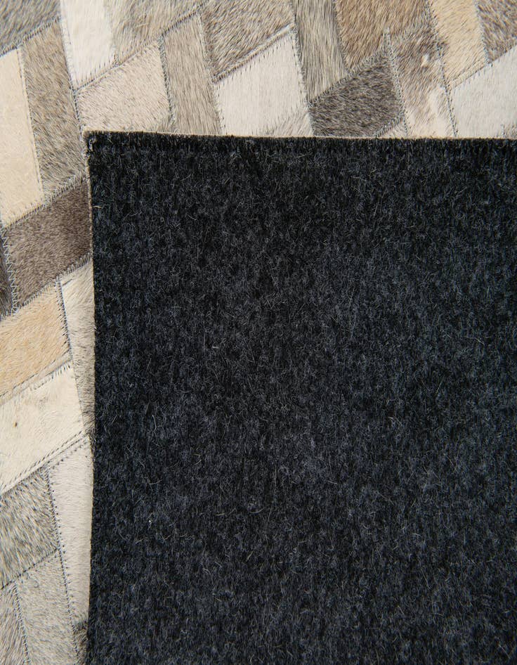 Detail image of 4' 4 x 6' 7 Cowhide Stocks Rug