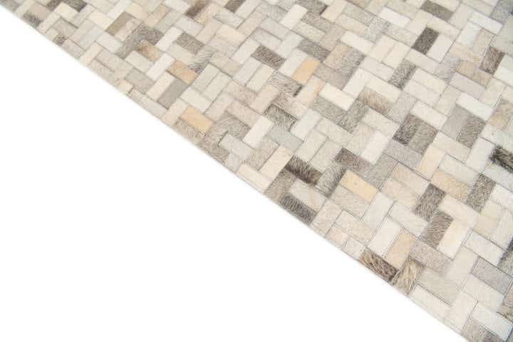 4' 8 x 6' 6 Cowhide Stocks Rug