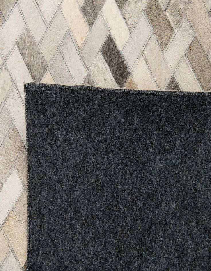 Detail image of 4' 8 x 6' 6 Cowhide Stocks Rug