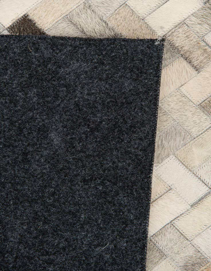 Detail image of 4' 7 x 6' 6 Cowhide Stocks Rug