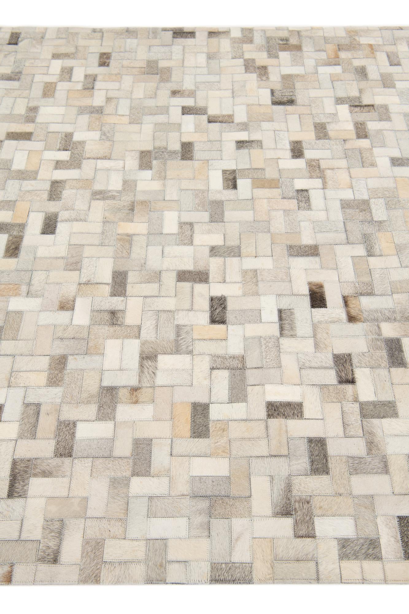 4' 8 x 6' 7 Cowhide Stocks Rug