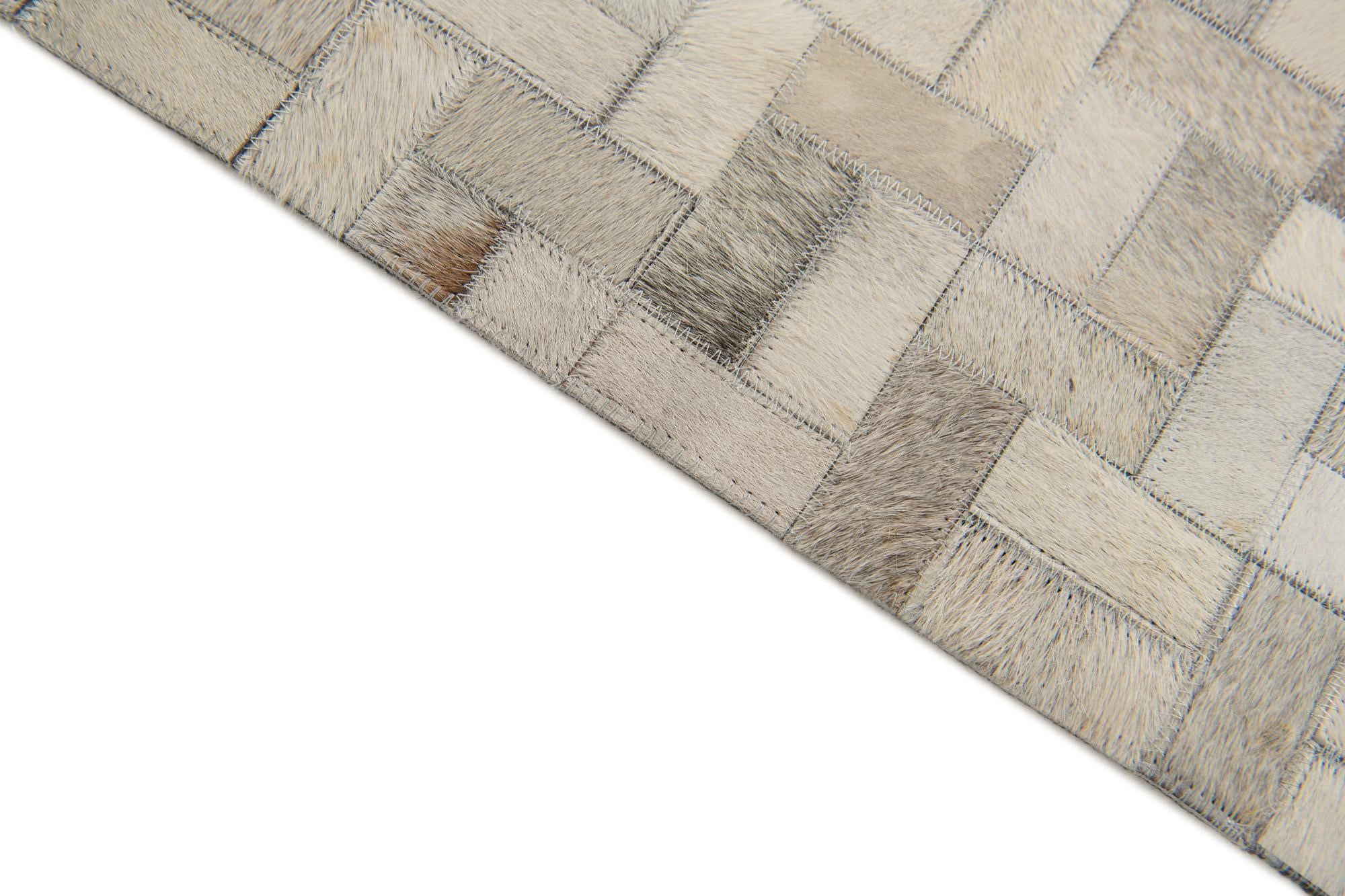 4' 8 x 6' 7 Cowhide Stocks Rug