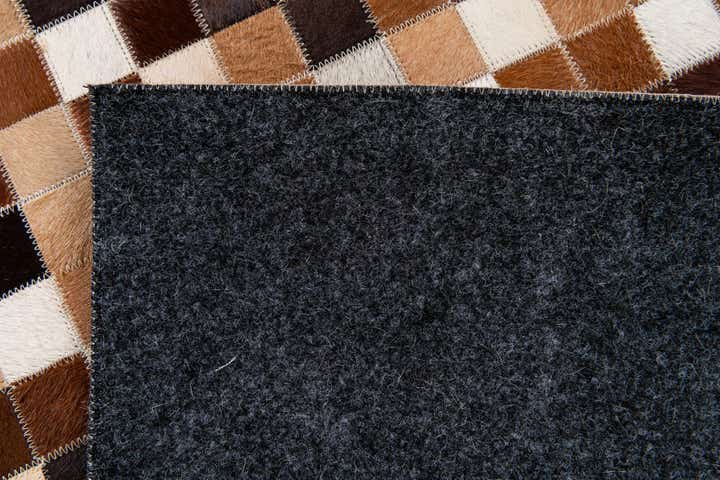 4' 9 x 6' 8 Cowhide Stocks Rug
