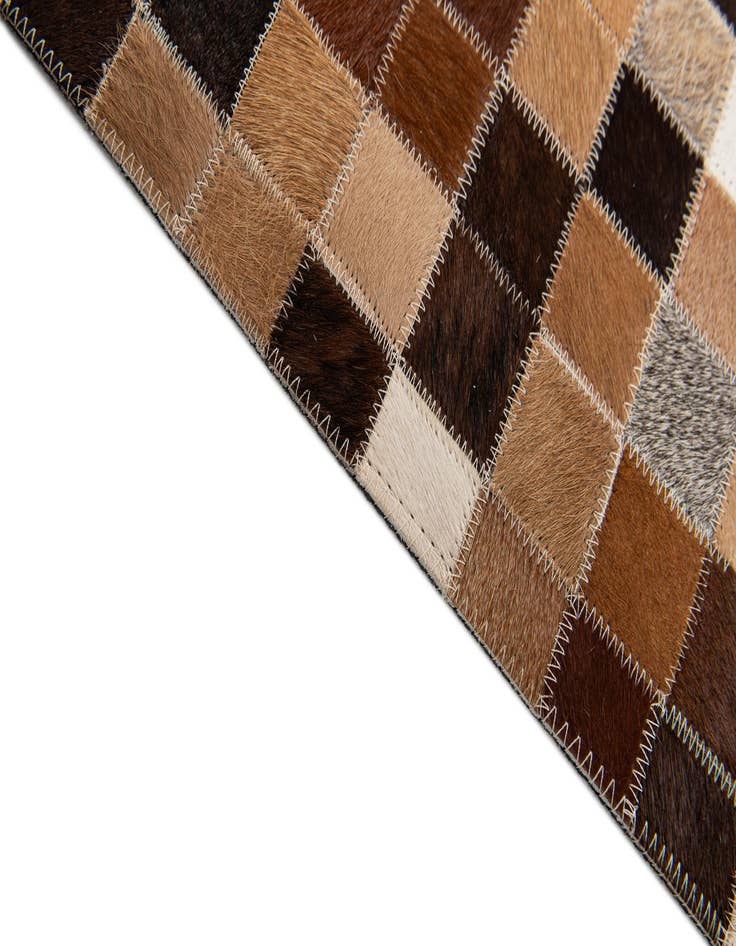 Detail image of 4' 8 x 6' 7 Cowhide Stocks Rug