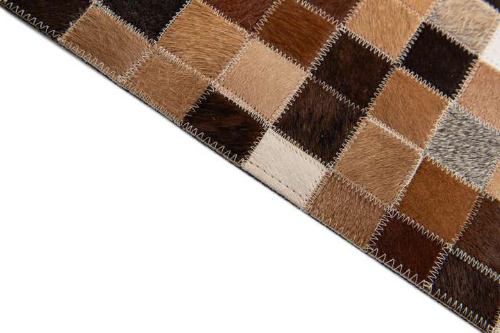 4' 8 x 6' 7 Cowhide Stocks Rug