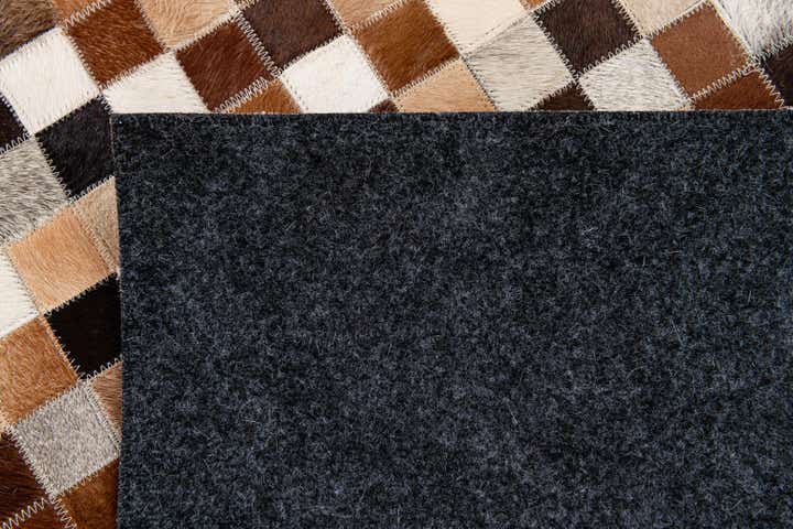 4' 8 x 6' 7 Cowhide Stocks Rug