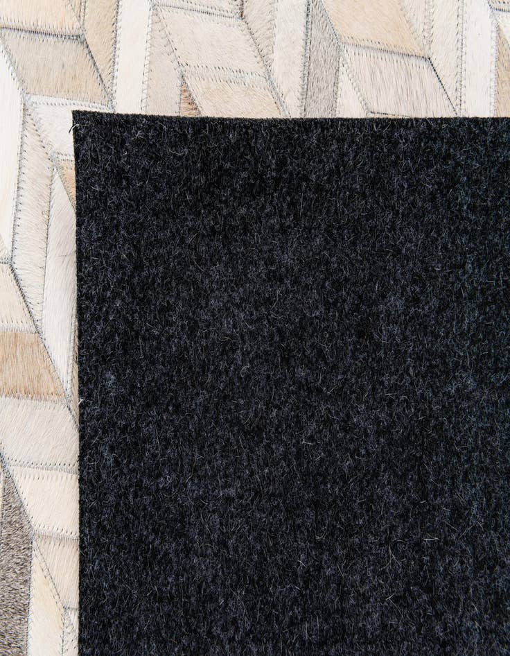 Detail image of 4' 9 x 6' 8 Cowhide Stocks Rug