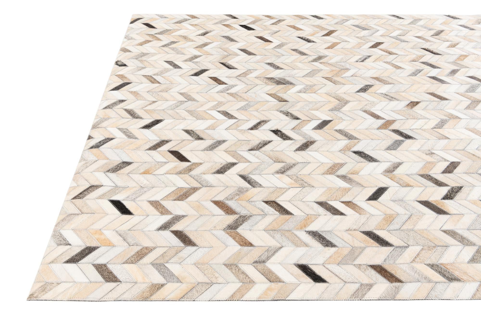 4' 8 x 6' 7 Cowhide Stocks Rug