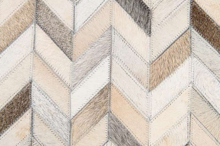 4' 8 x 6' 7 Cowhide Stocks Rug