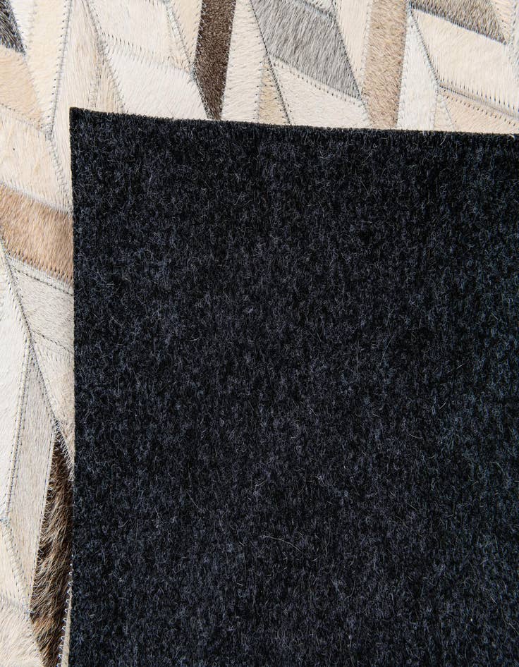 Detail image of 4' 8 x 6' 7 Cowhide Stocks Rug