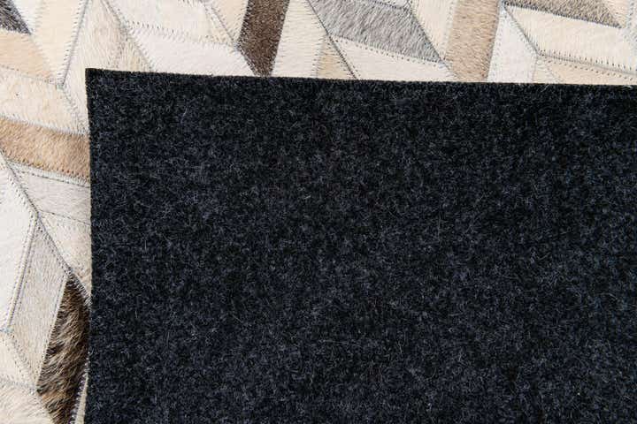4' 8 x 6' 7 Cowhide Stocks Rug