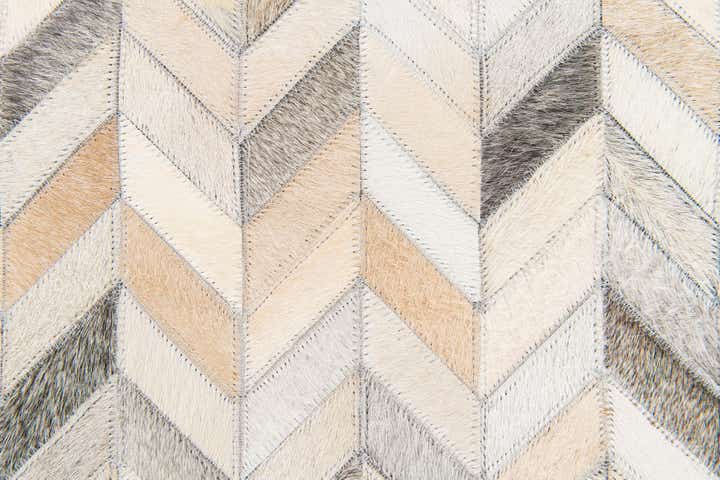 4' 8 x 6' 6 Cowhide Stocks Rug