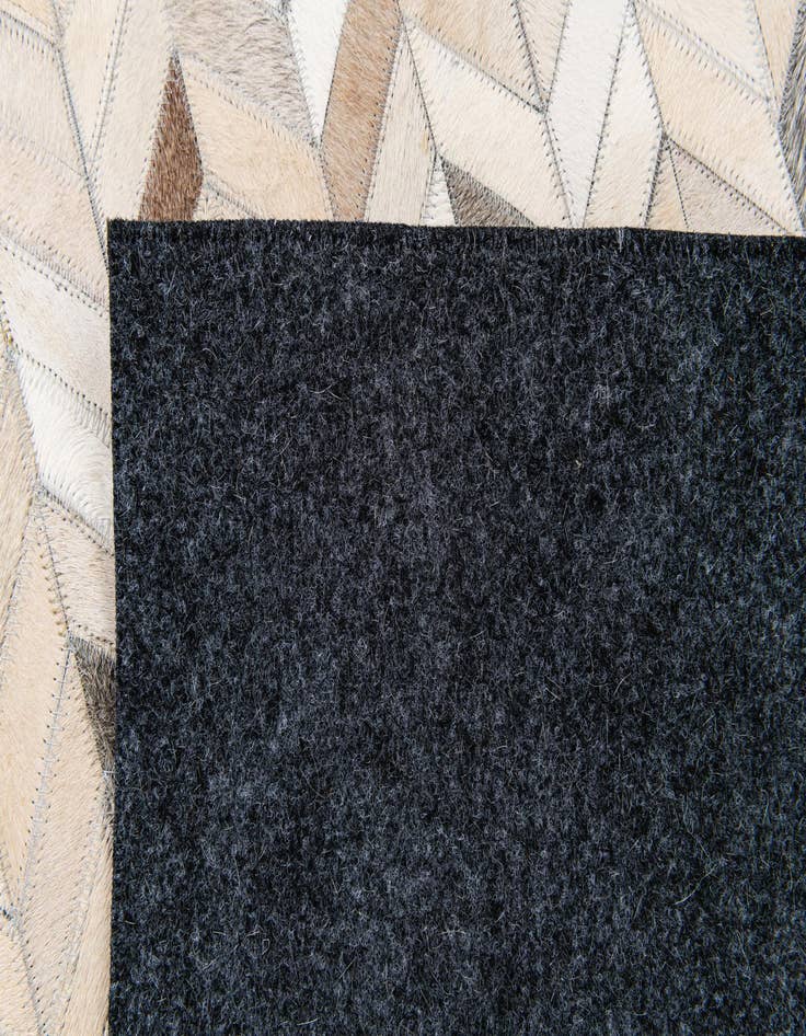 Detail image of 4' 7 x 6' 9 Cowhide Stocks Rug