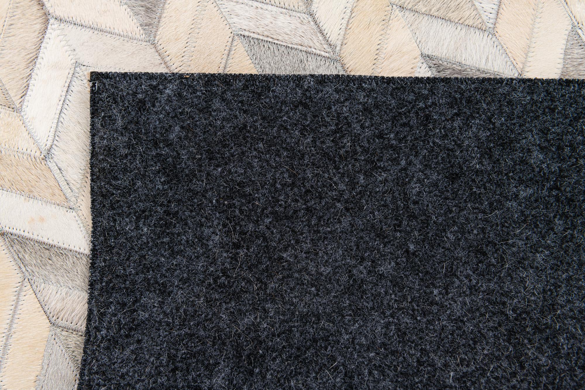 4' 8 x 6' 8 Cowhide Stocks Rug