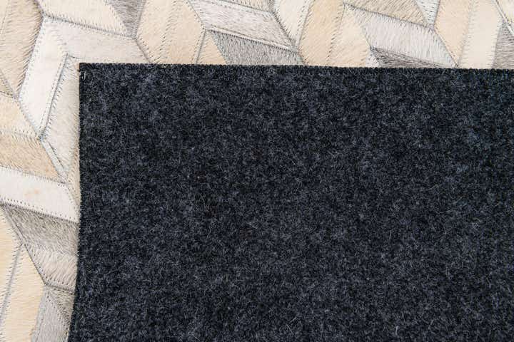 4' 8 x 6' 8 Cowhide Stocks Rug