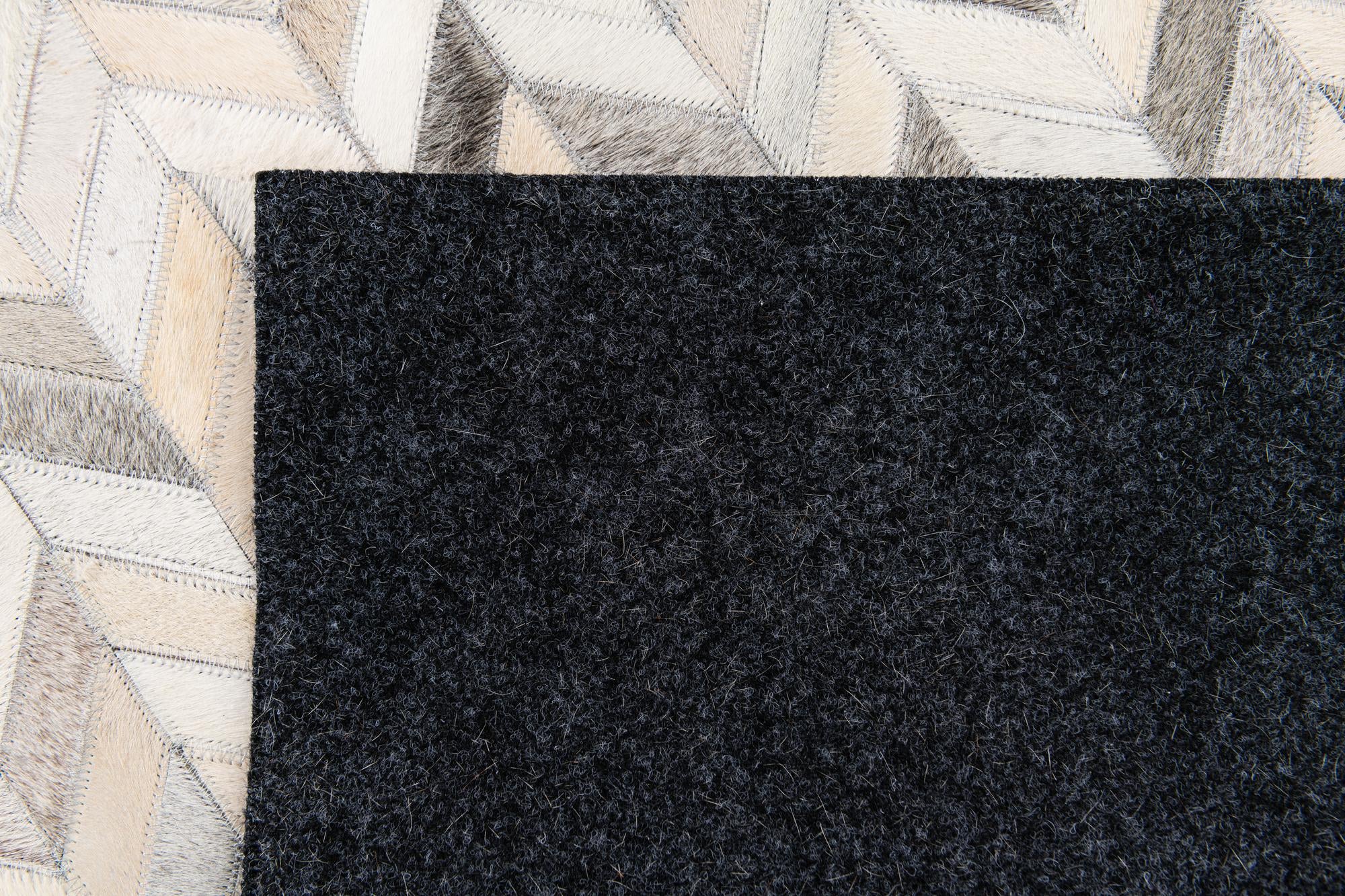4' 7 x 6' 8 Cowhide Stocks Rug