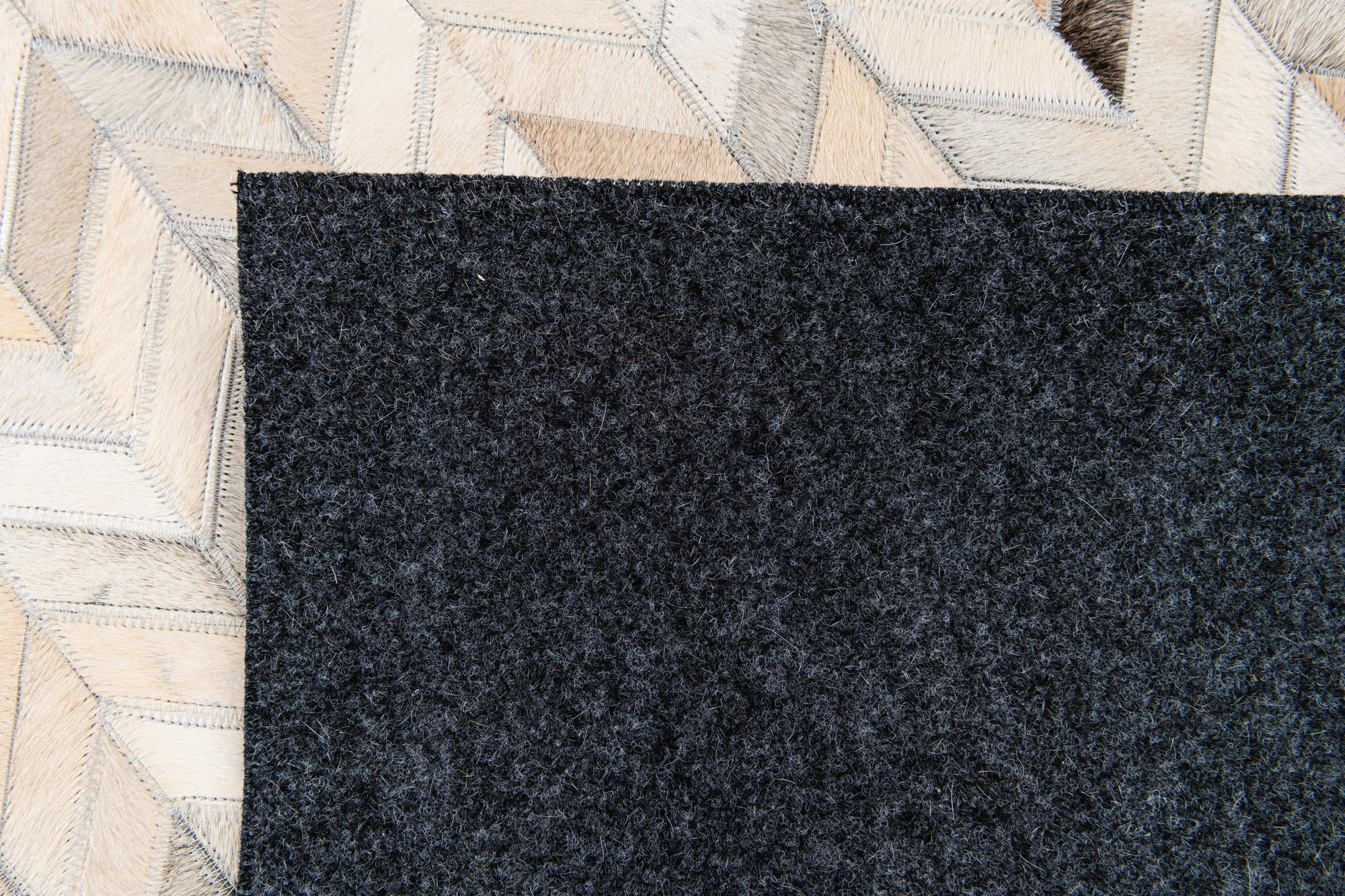 4' 7 x 6' 7 Cowhide Stocks Rug