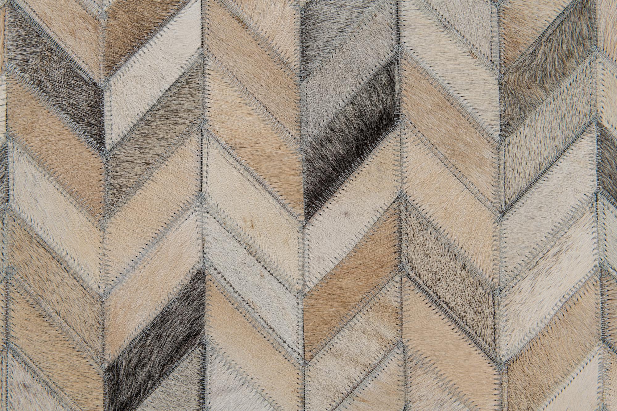 4' 8 x 6' 7 Cowhide Stocks Rug