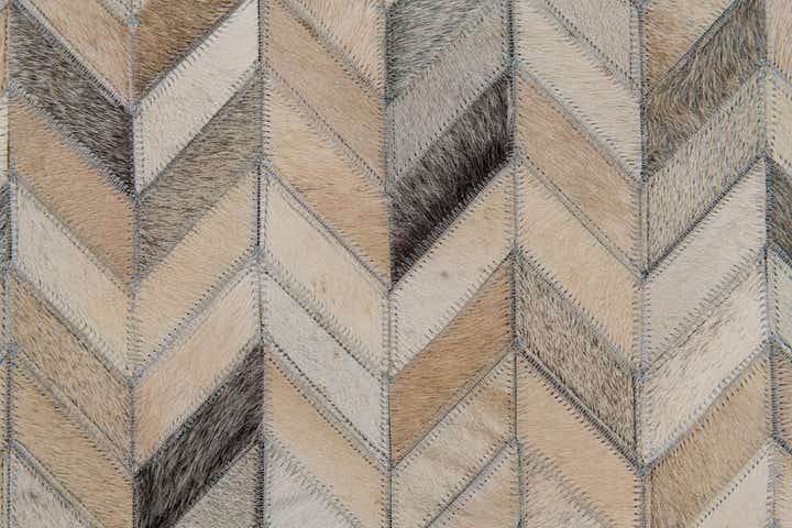 4' 8 x 6' 7 Cowhide Stocks Rug