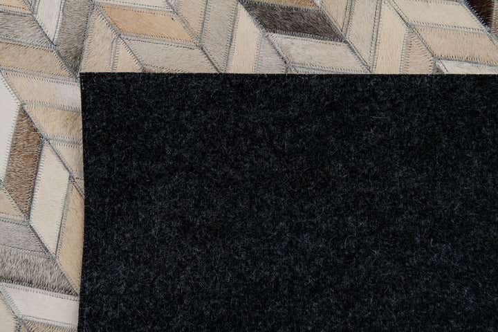 4' 8 x 6' 7 Cowhide Stocks Rug