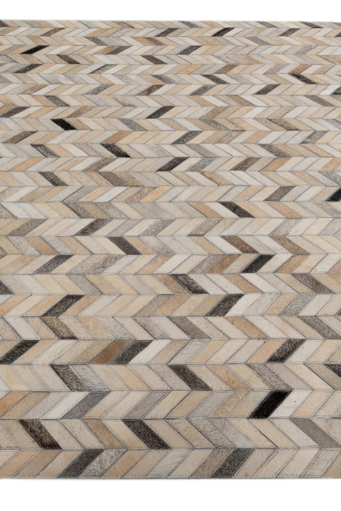 4' 8 x 6' 7 Cowhide Stocks Rug