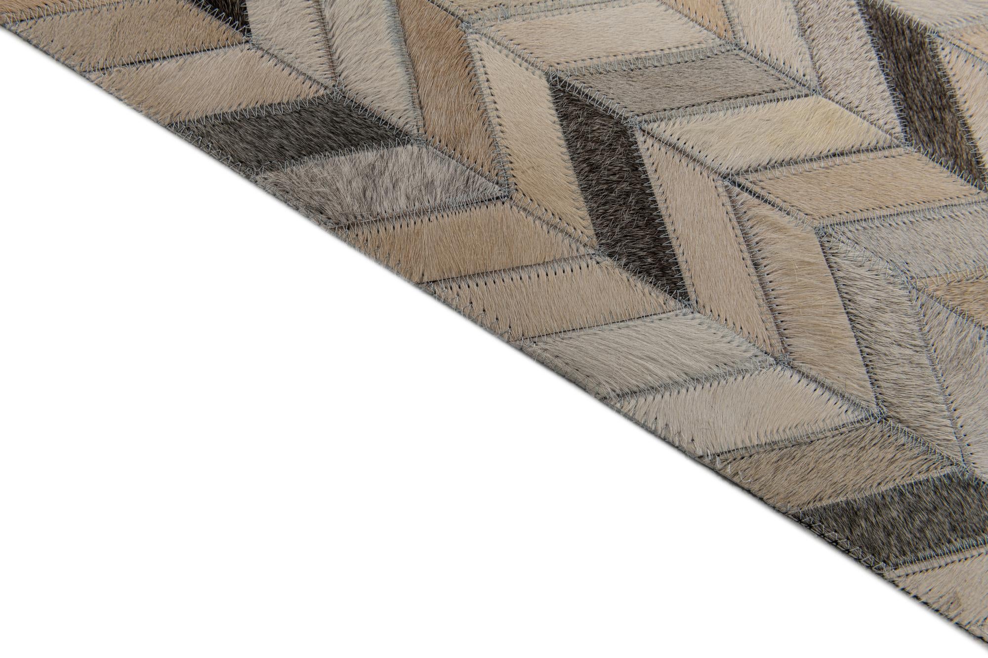 4' 8 x 6' 7 Cowhide Stocks Rug