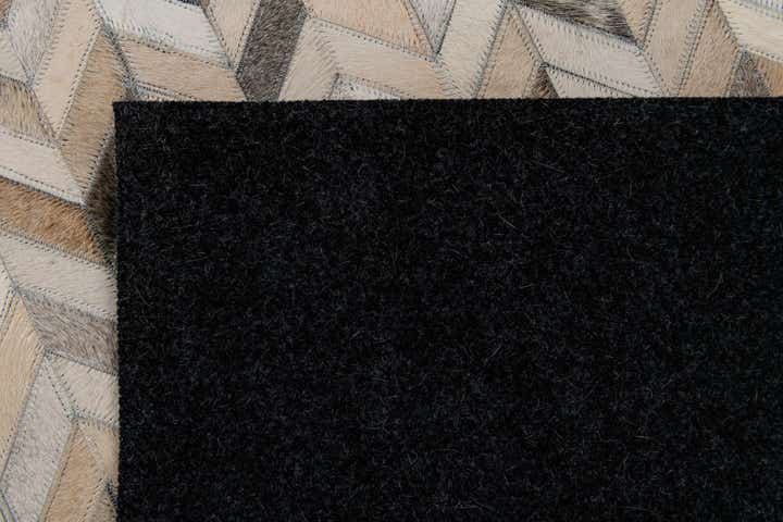 4' 8 x 6' 7 Cowhide Stocks Rug
