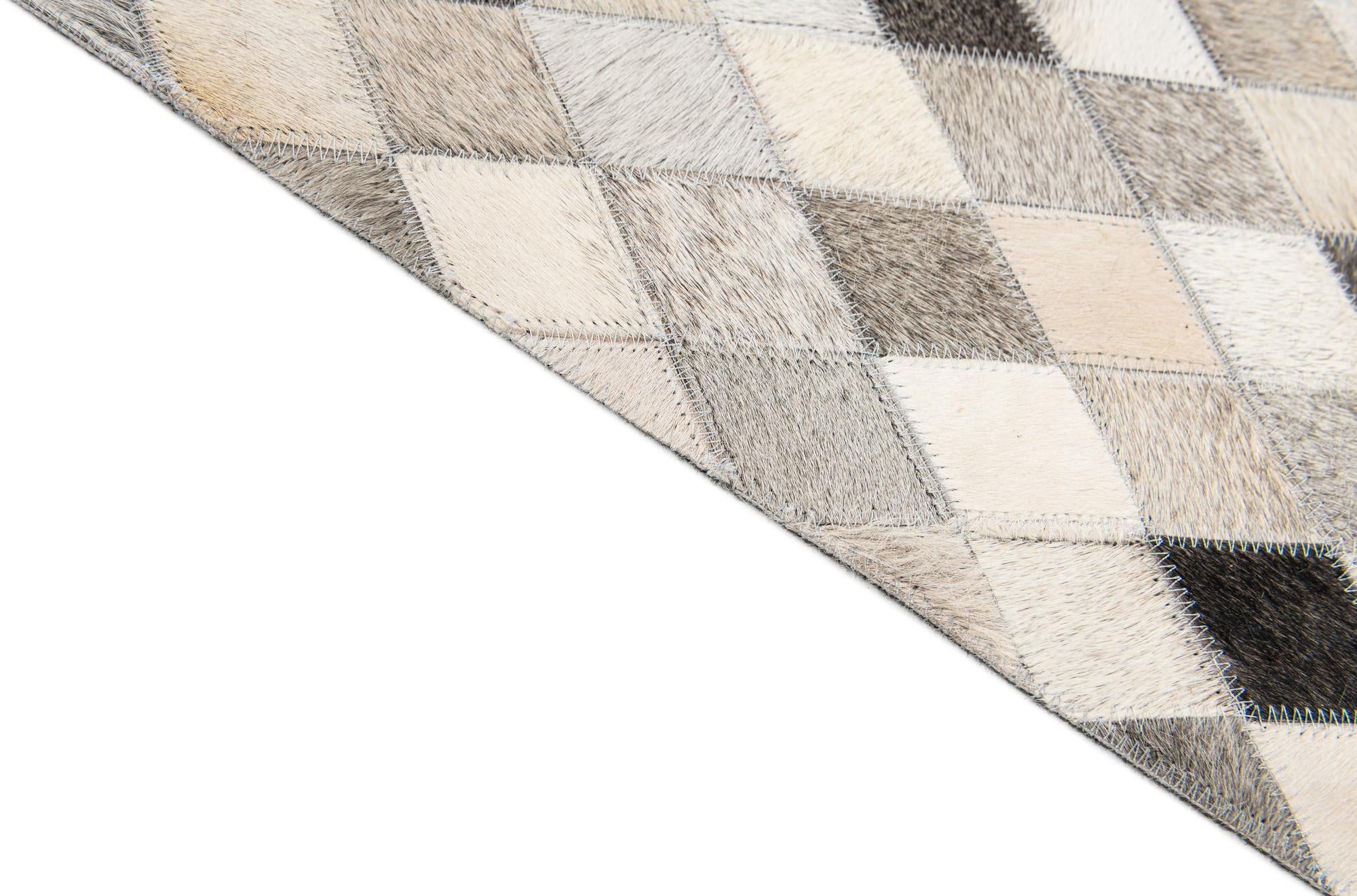 4' 8 x 6' 8 Cowhide Stocks Rug
