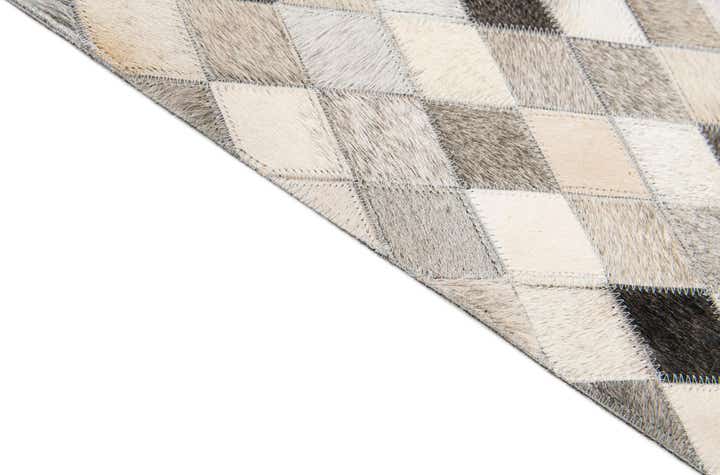4' 8 x 6' 8 Cowhide Stocks Rug