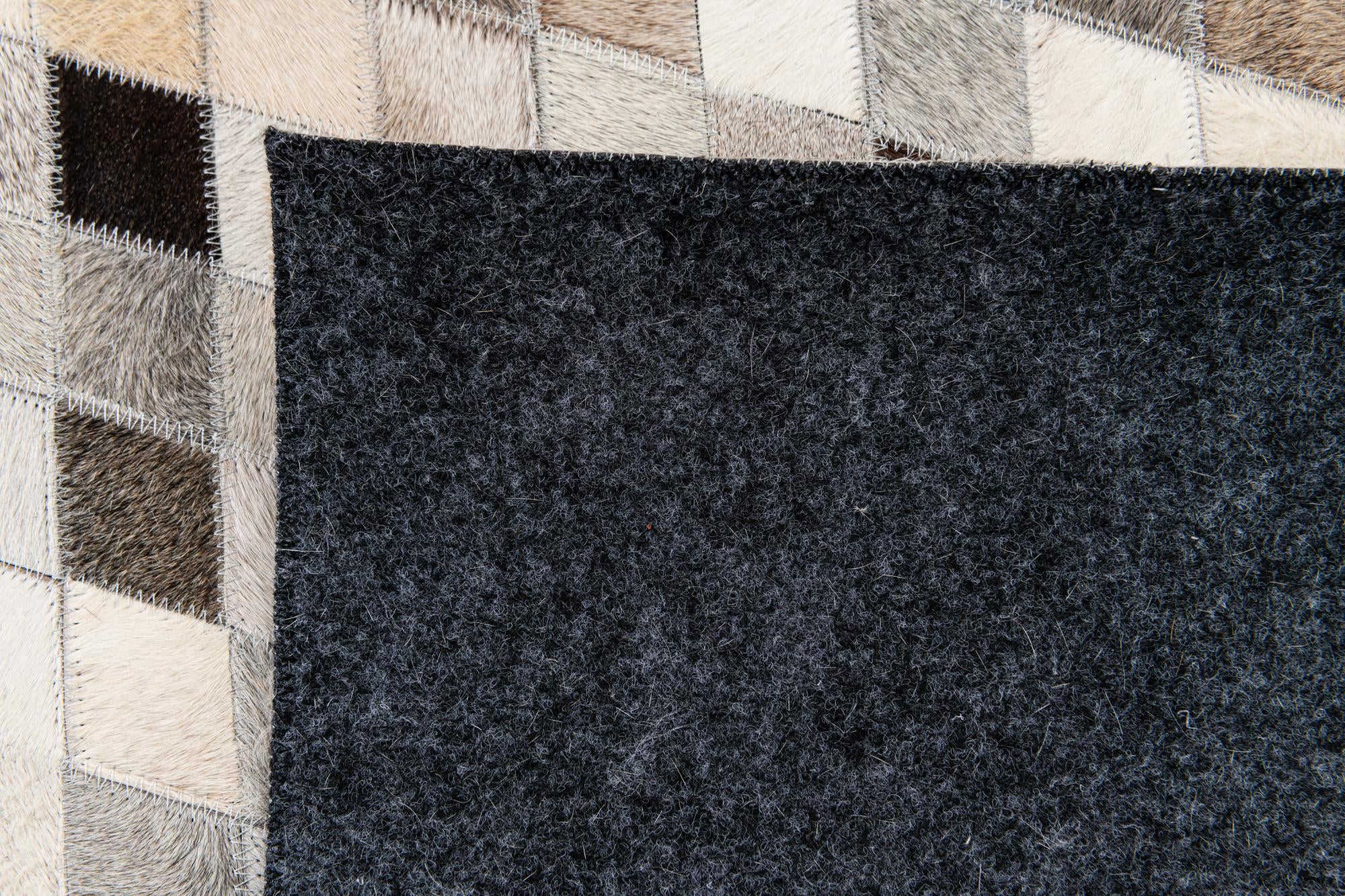 4' 8 x 6' 8 Cowhide Stocks Rug