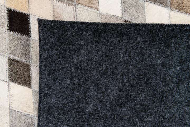 4' 8 x 6' 8 Cowhide Stocks Rug