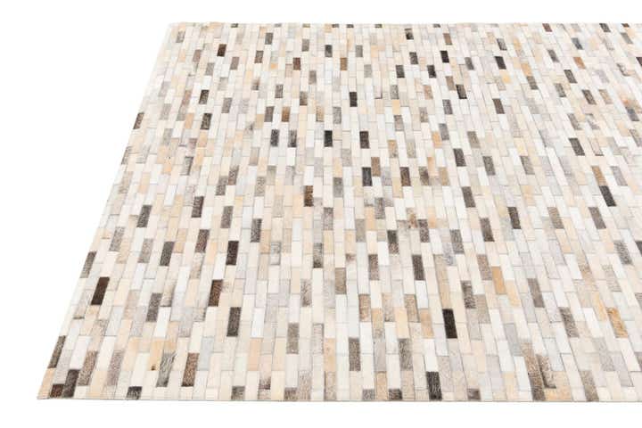 4' 8 x 6' 6 Cowhide Stocks Rug