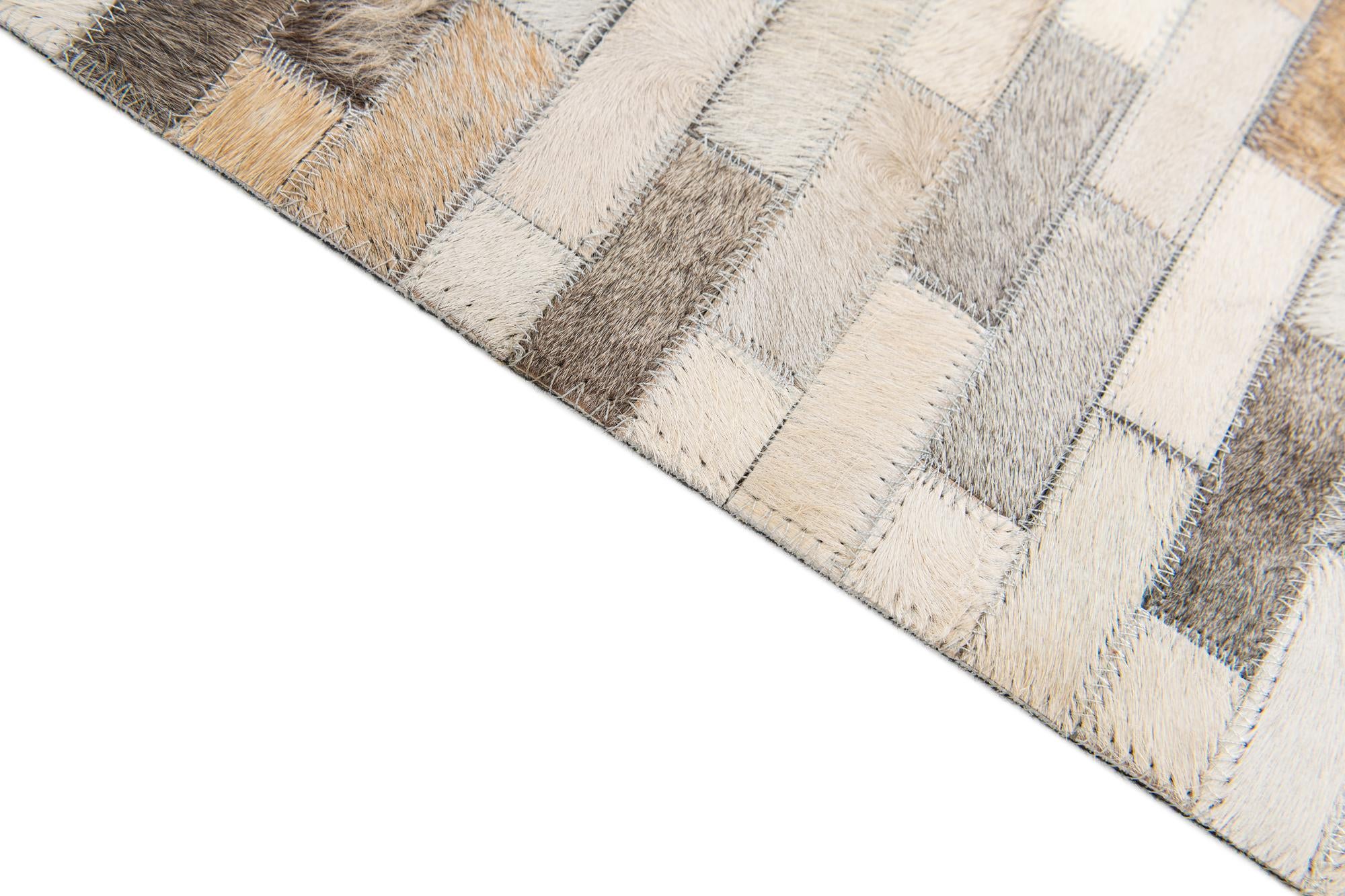 4' 8 x 6' 6 Cowhide Stocks Rug