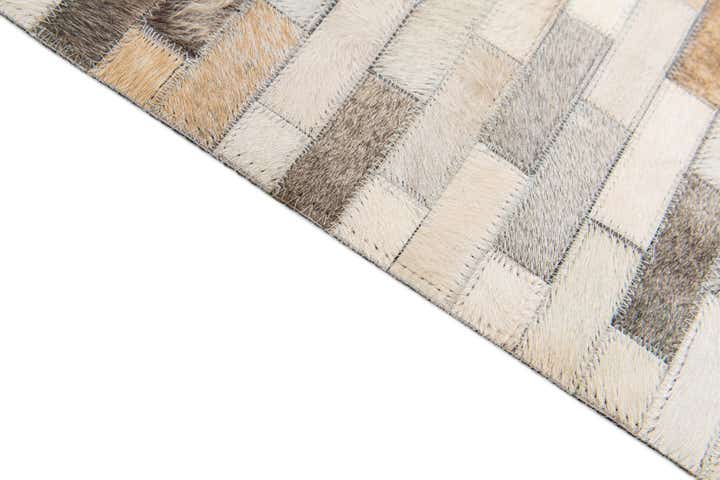 4' 8 x 6' 6 Cowhide Stocks Rug